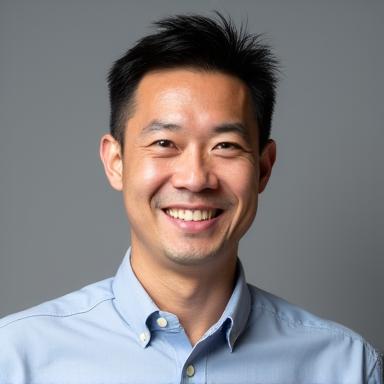 Professional headshot of David Chen.